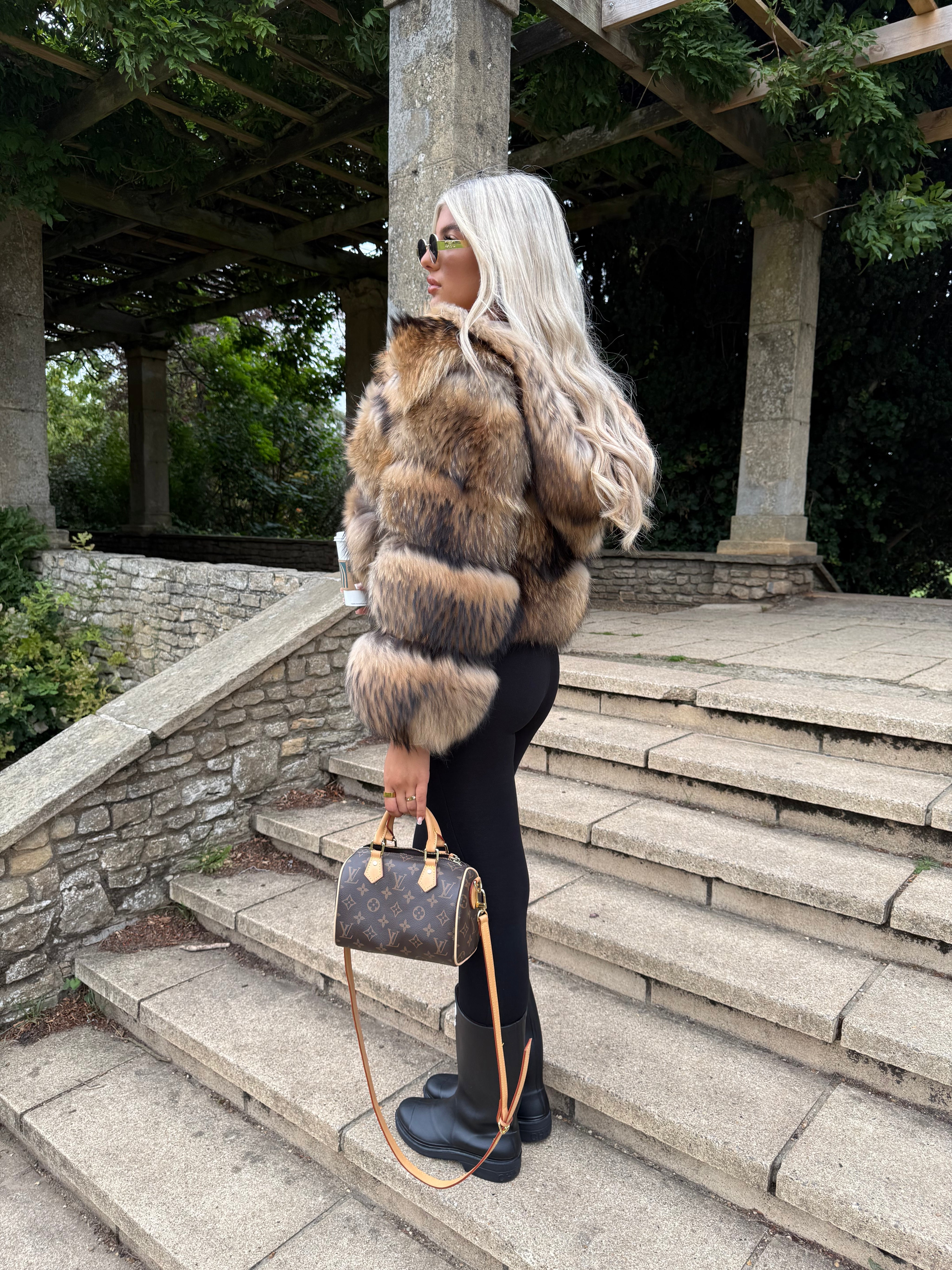 Racoon fur coat in stock