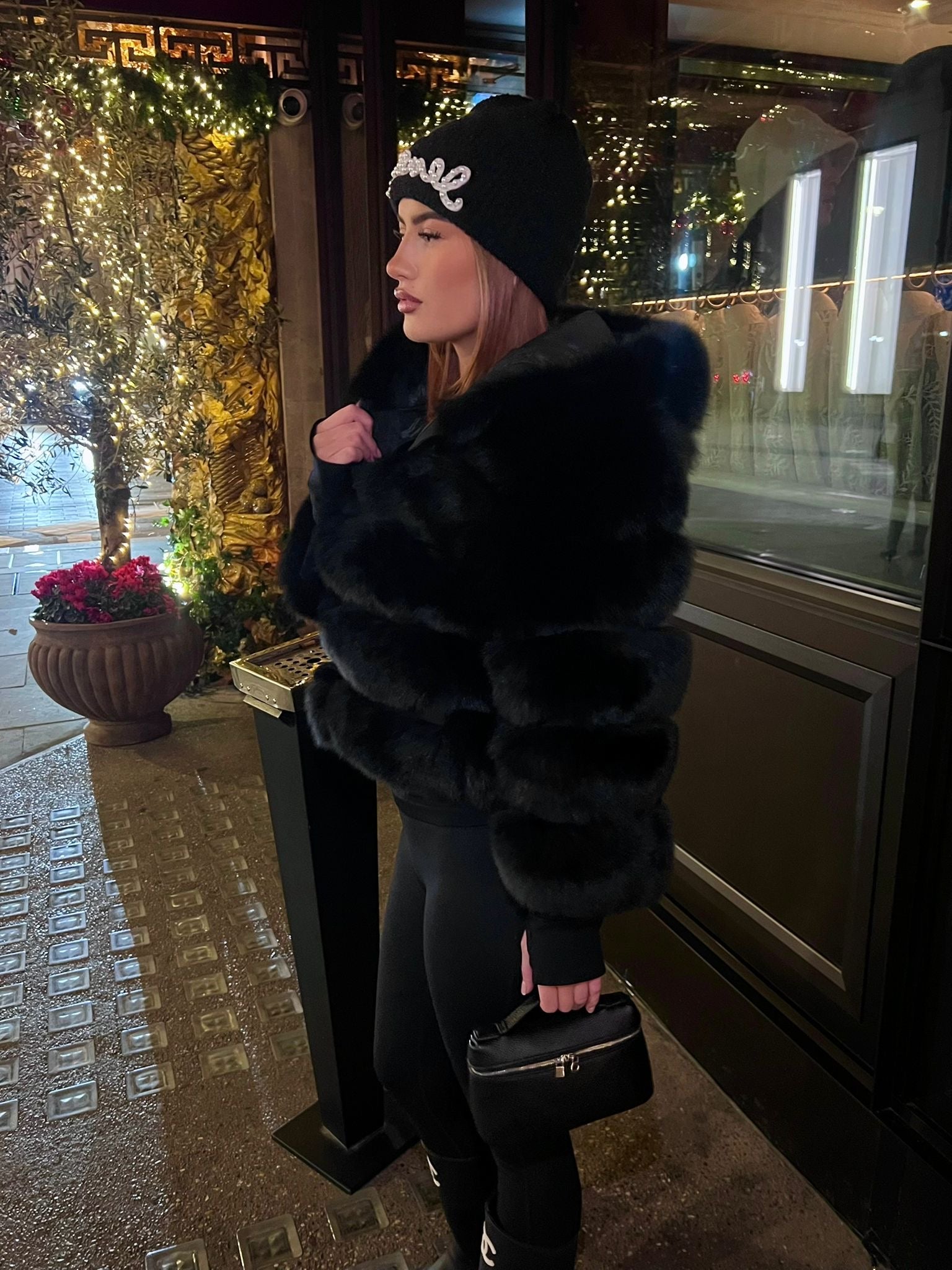 Black hooded fox fur coat