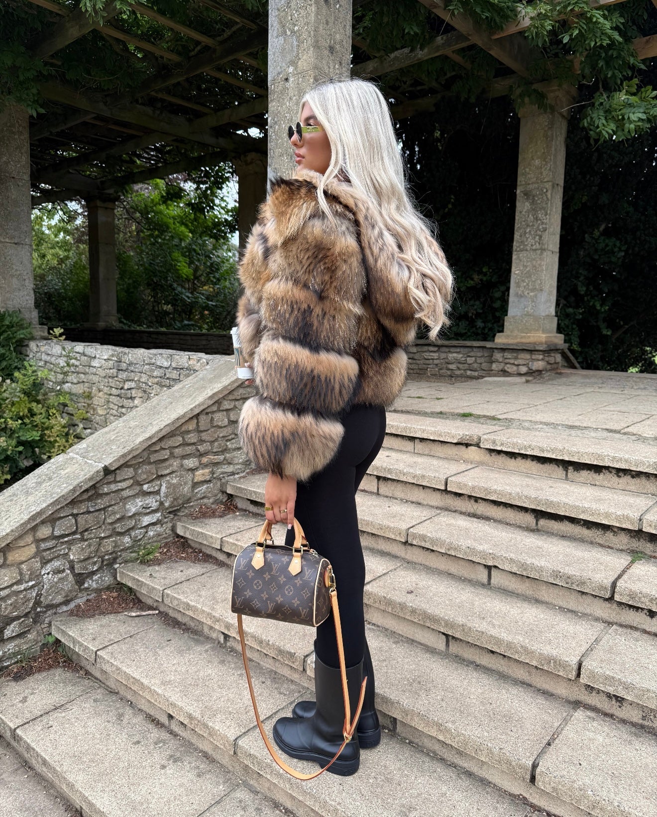 Racoon fur coat in stock